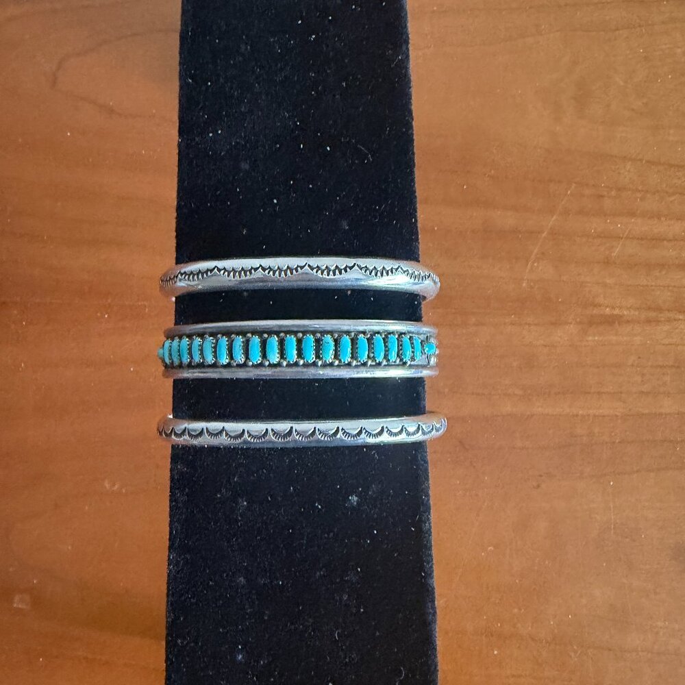 Turquoise and sterling silver cuff bracelets. This is a set of 3. Vintage.